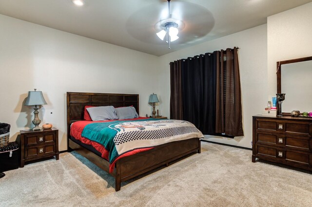 carpeted bedroom featuring ceiling fan