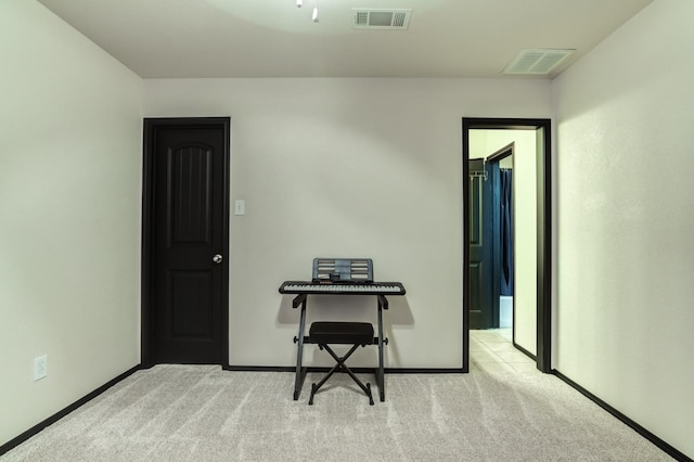 view of carpeted home office