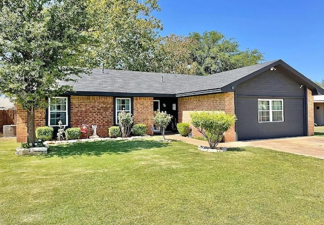 ranch-style home with cooling unit and a front lawn