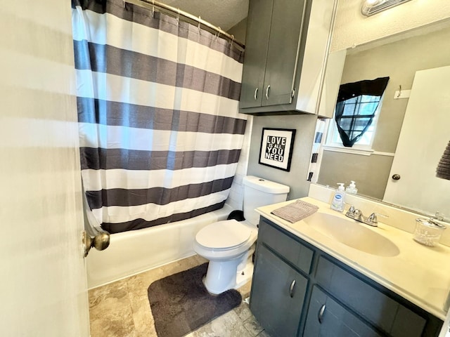 full bathroom featuring vanity, toilet, a textured ceiling, and shower / bath combo with shower curtain