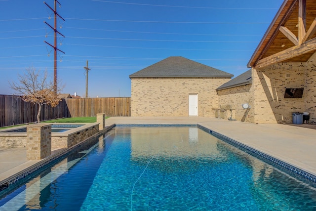 view of pool with a fenced in pool, a patio area, a fenced backyard, and an in ground hot tub