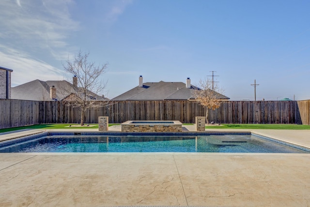 view of pool featuring a fenced in pool, a fenced backyard, and an in ground hot tub