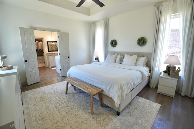 bedroom featuring wood finished floors and a ceiling fan