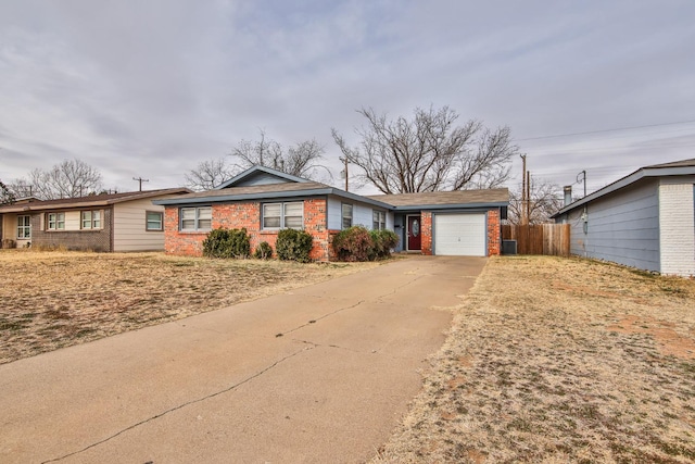 single story home featuring a garage