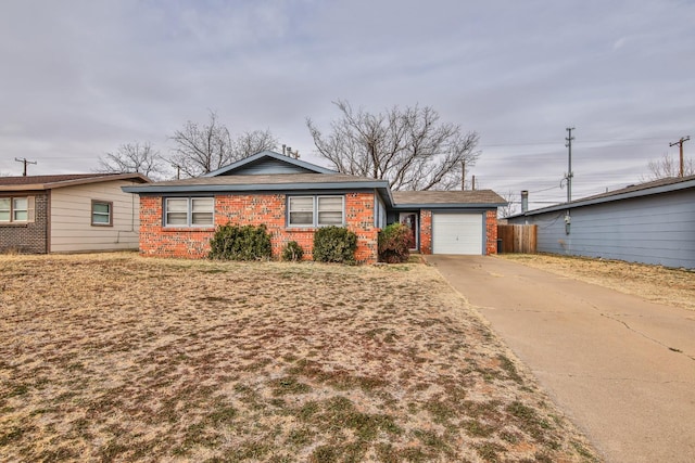 single story home with a garage