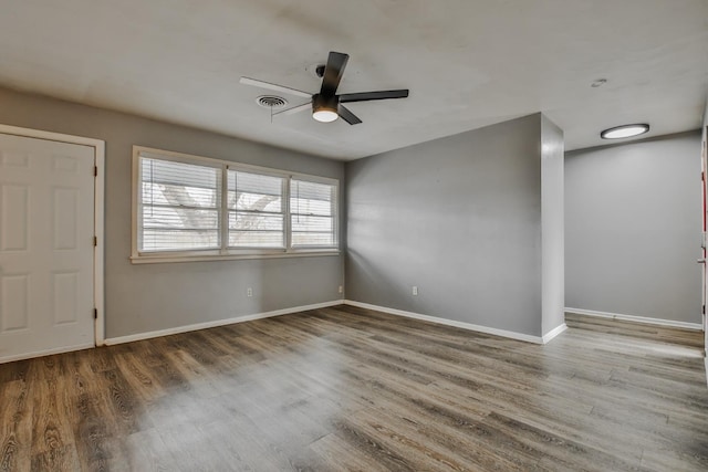 interior space featuring ceiling fan and wood-type flooring