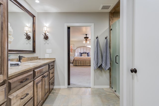 full bathroom with a shower stall, visible vents, ceiling fan, and ensuite bath