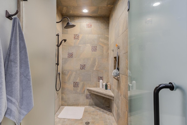 bathroom with a shower stall