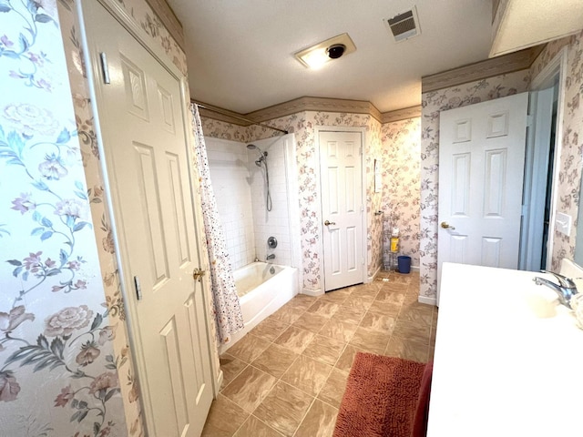 bathroom with shower / bath combination with curtain and vanity