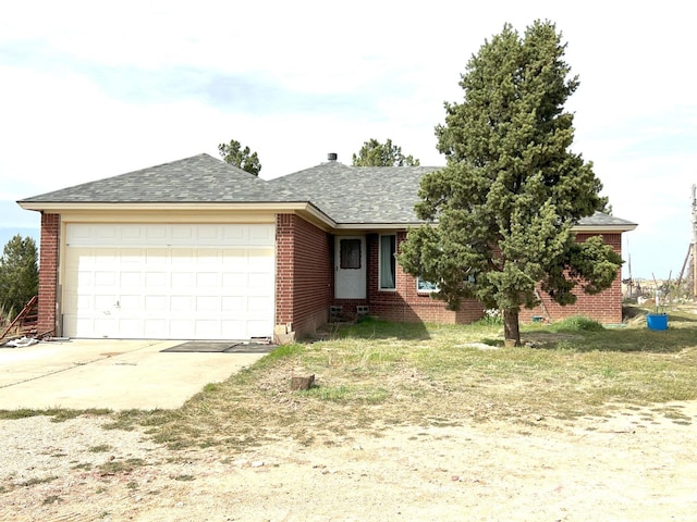 single story home featuring a garage