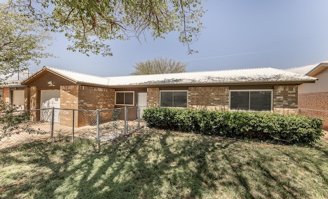 ranch-style home with a front lawn