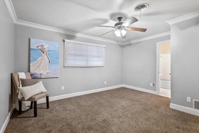 unfurnished room featuring ornamental molding, carpet, and ceiling fan