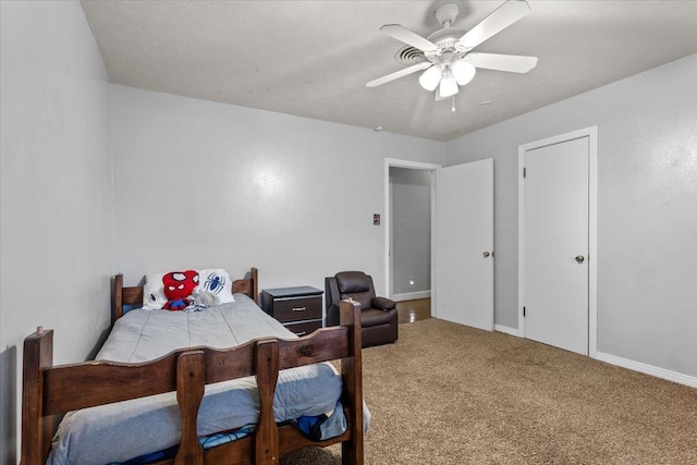 bedroom featuring ceiling fan and carpet flooring