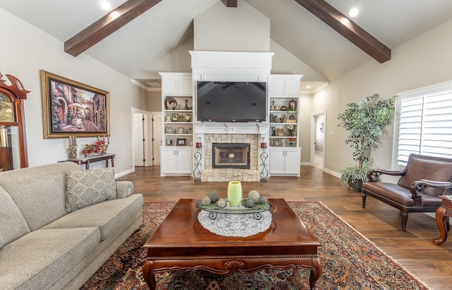 living room with a stone fireplace, dark wood-type flooring, high vaulted ceiling, and beam ceiling