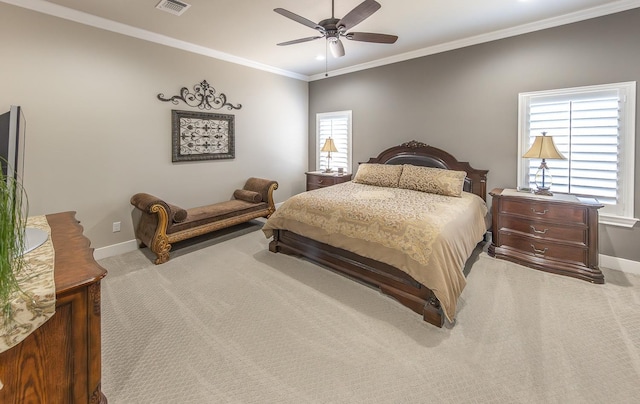 bedroom featuring crown molding, light colored carpet, visible vents, ceiling fan, and baseboards