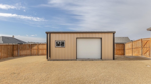 garage featuring fence