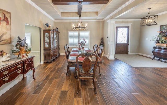 dining room with an inviting chandelier, baseboards, and dark wood finished floors