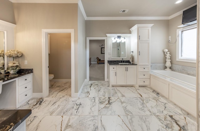 bathroom featuring a garden tub, toilet, visible vents, marble finish floor, and ornamental molding