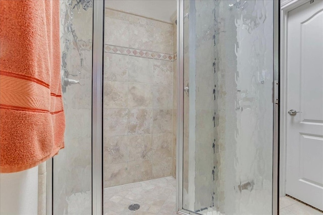 bathroom with an enclosed shower