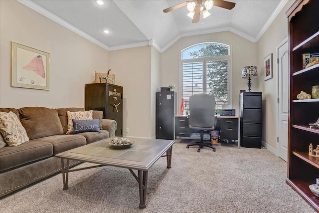 carpeted home office with vaulted ceiling, a textured ceiling, ceiling fan, and crown molding