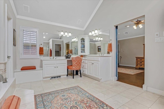 bathroom featuring crown molding, tile patterned floors, high vaulted ceiling, and vanity