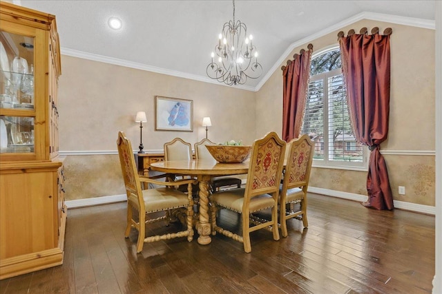 dining room with lofted ceiling, ornamental molding, dark hardwood / wood-style floors, and a chandelier