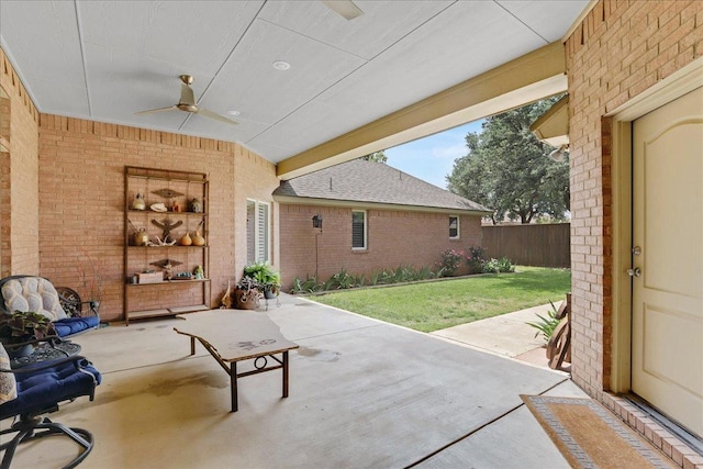 view of patio featuring ceiling fan