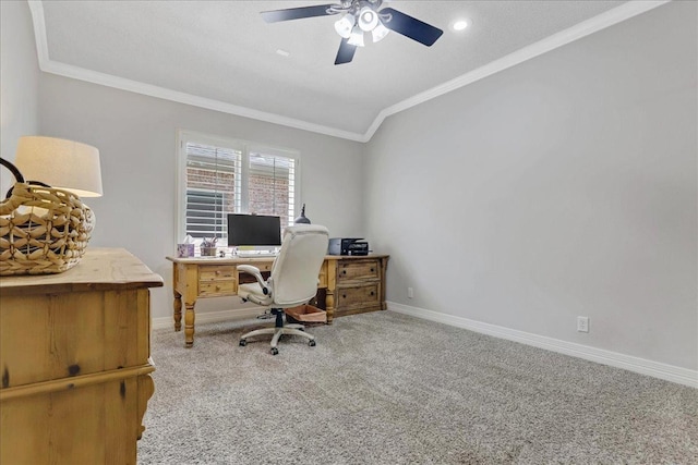 carpeted office space with crown molding and ceiling fan