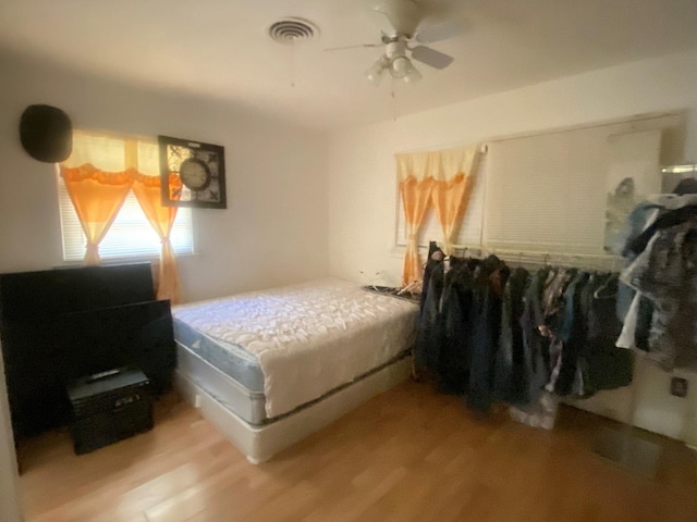 bedroom with light hardwood / wood-style flooring