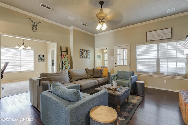 1310 Yorkshire Ave, Wolfforth, TX 79382 - living room featuring baseboards, plenty of natural light, and dark wood-type flooring