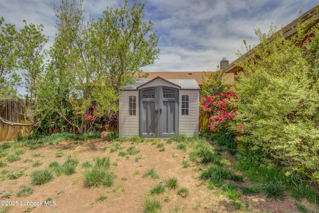 1310 Yorkshire Ave, Wolfforth, TX 79382 - view of shed featuring fence