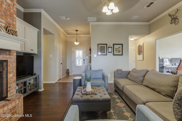 1310 Yorkshire Ave, Wolfforth, TX 79382 - living room with baseboards, visible vents, ornamental molding, and wood finished floors