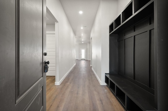 mudroom with hardwood / wood-style floors