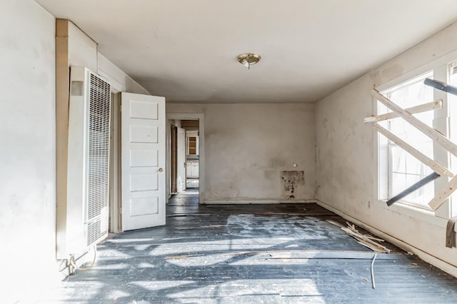 miscellaneous room featuring dark hardwood / wood-style floors