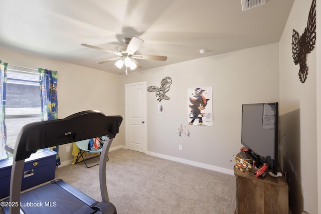 1806 141st St, Lubbock, TX 79423 - workout room with carpet floors, a ceiling fan, and baseboards