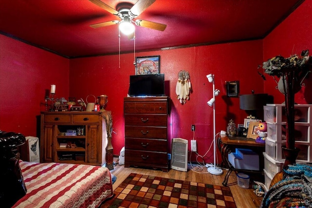 bedroom featuring wood finished floors