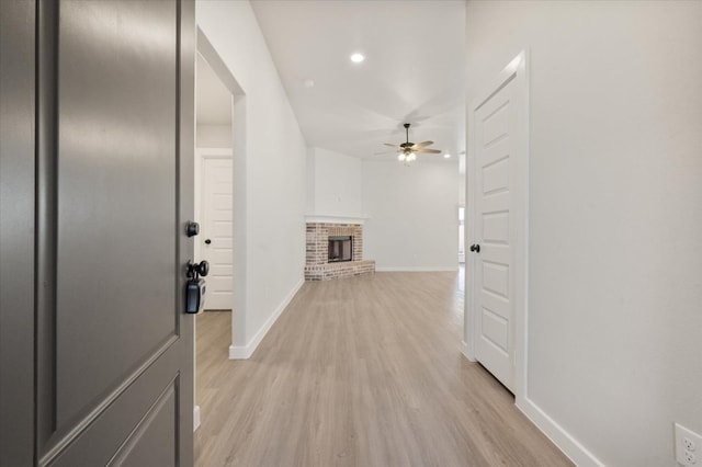 corridor featuring light hardwood / wood-style flooring