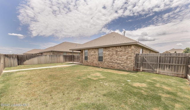 5234 Jarvis St, Lubbock, TX 79416 - rear view of property with brick siding and a fenced backyard