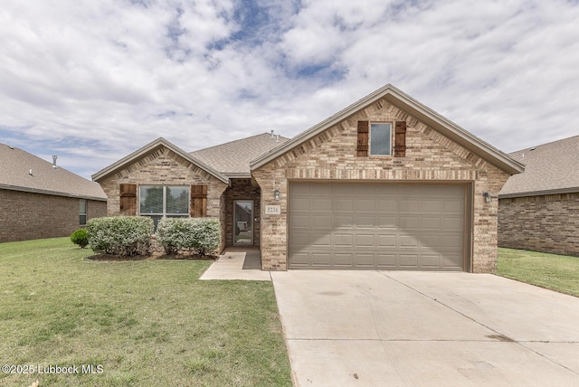 5234 Jarvis St, Lubbock, TX 79416 - view of front facade with brick siding, driveway, a front lawn, a garage, and roof with shingles