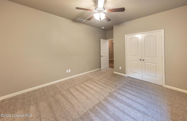 5234 Jarvis St, Lubbock, TX 79416 - unfurnished bedroom with carpet flooring, a closet, and a ceiling fan