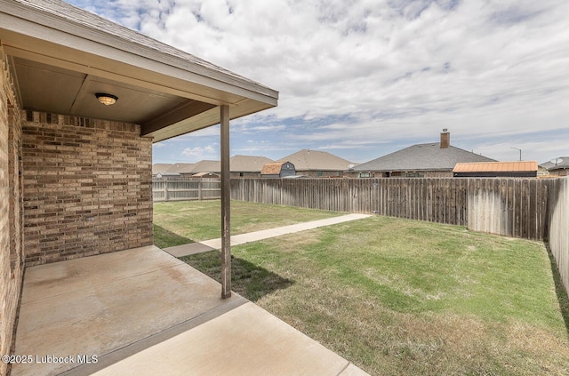 5234 Jarvis St, Lubbock, TX 79416 - fenced backyard with a patio and a residential view