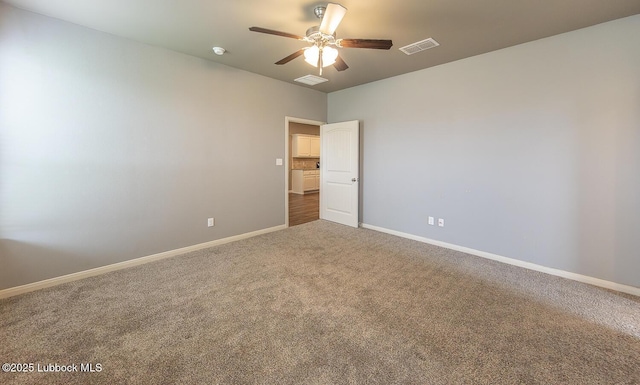 5234 Jarvis St, Lubbock, TX 79416 - carpeted spare room featuring a ceiling fan and baseboards