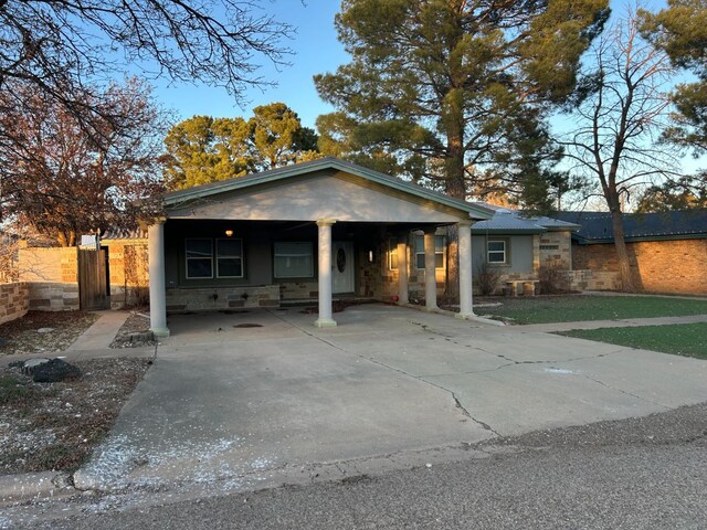 view of front of house with a carport