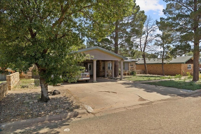 view of front of house with a carport