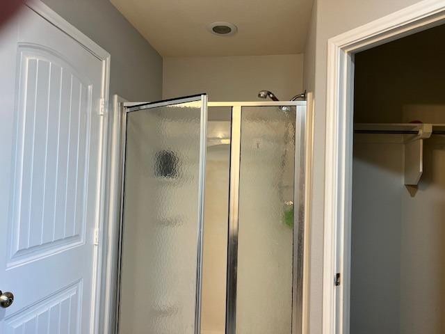 bathroom featuring walk in shower