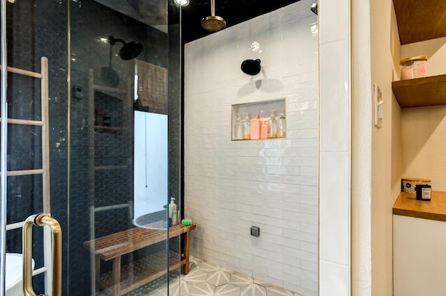 bathroom with a shower with shower door