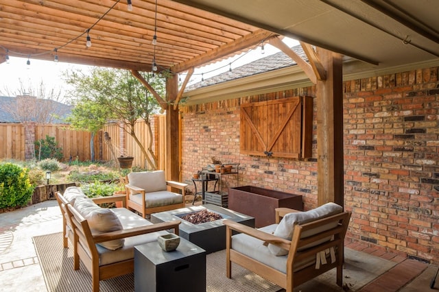 view of patio / terrace with an outdoor living space with a fire pit