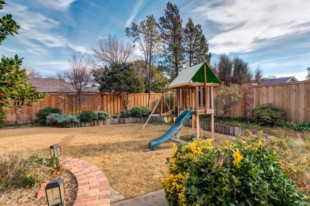 view of jungle gym featuring a yard