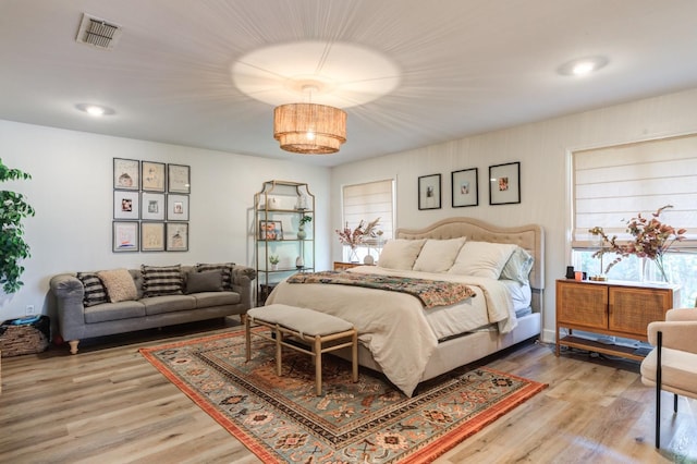 bedroom featuring wood-type flooring