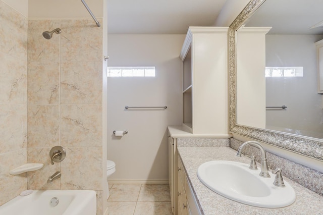 full bathroom with tiled shower / bath combo, vanity, tile patterned flooring, and toilet